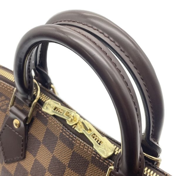 5 Louis Vuitton Alma Damier Canvas Handbag