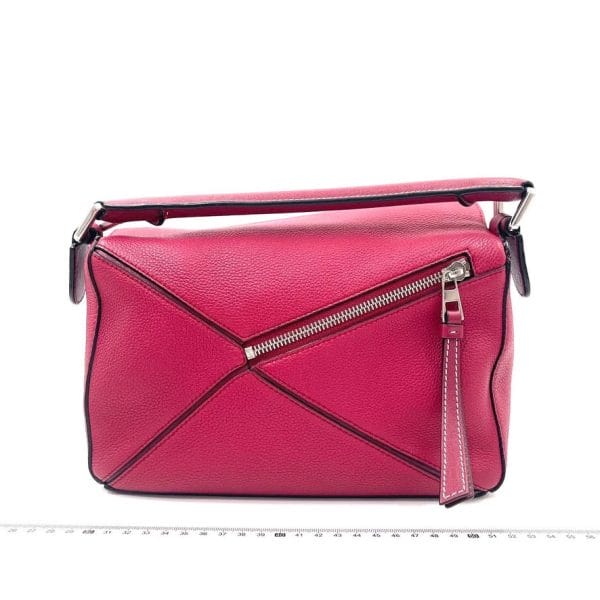 Puzzle Loewe Puzzle bag small raspberry pink leather